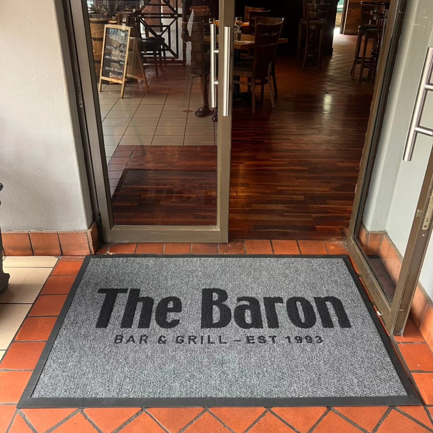 Durable branded entrance mats for offices, retail, hotels, and high-traffic commercial spaces.